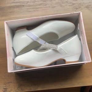 Like new worn once as flower girl shoes.